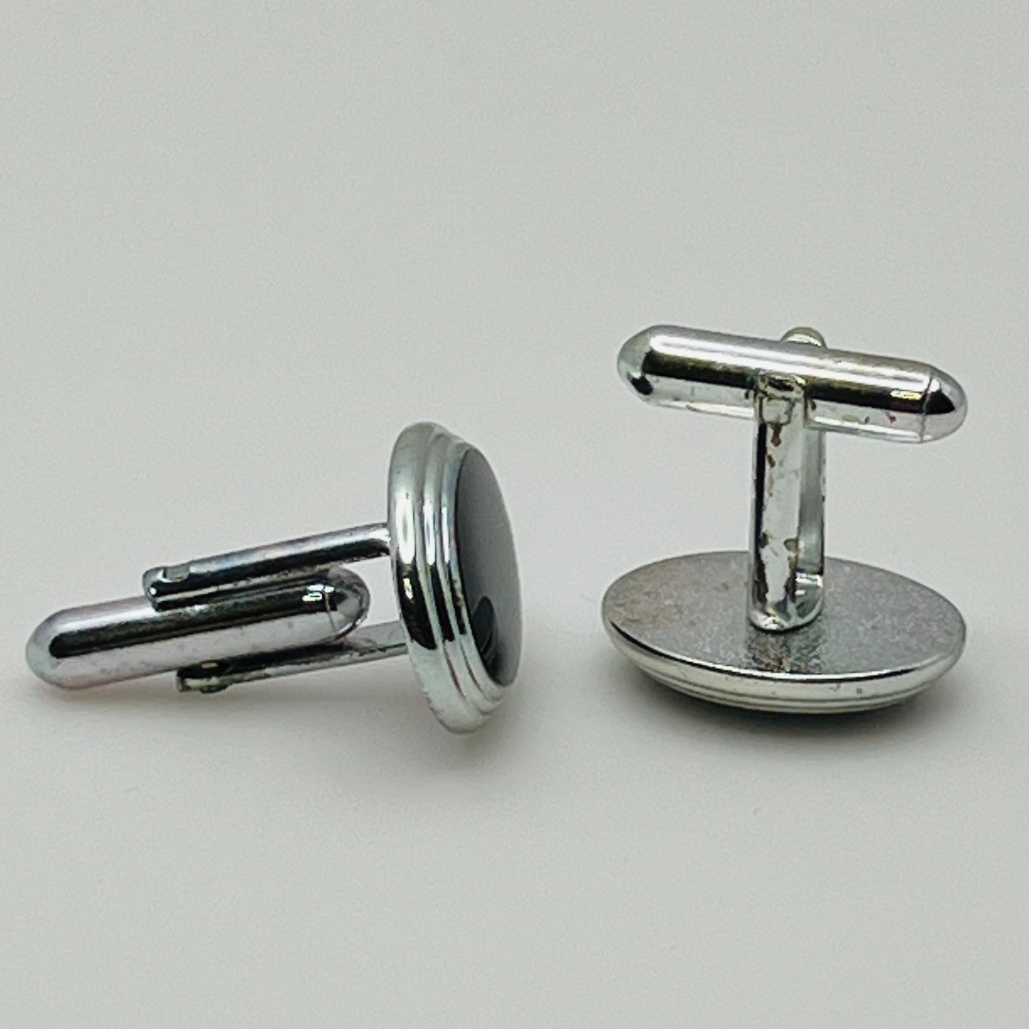 Vintage silver oval cufflinks with black resin center