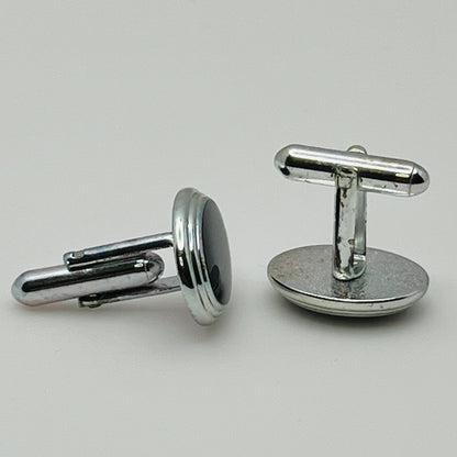 Vintage silver oval cufflinks with black resin center