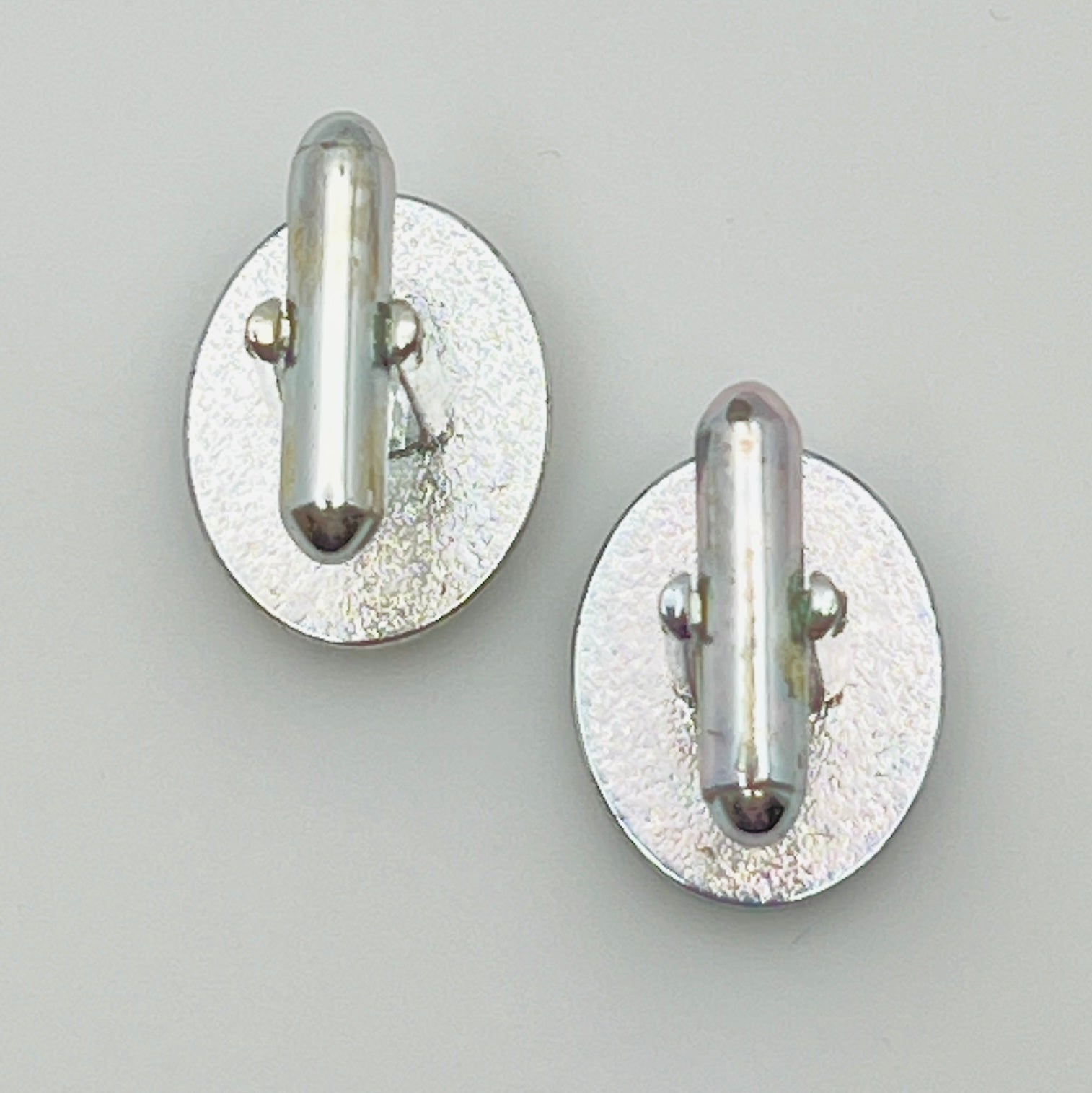 Vintage silver oval cufflinks with black resin center