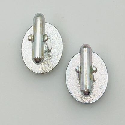 Vintage silver oval cufflinks with black resin center