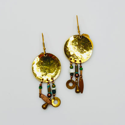 Back view hammered gold tone disc boho earrings