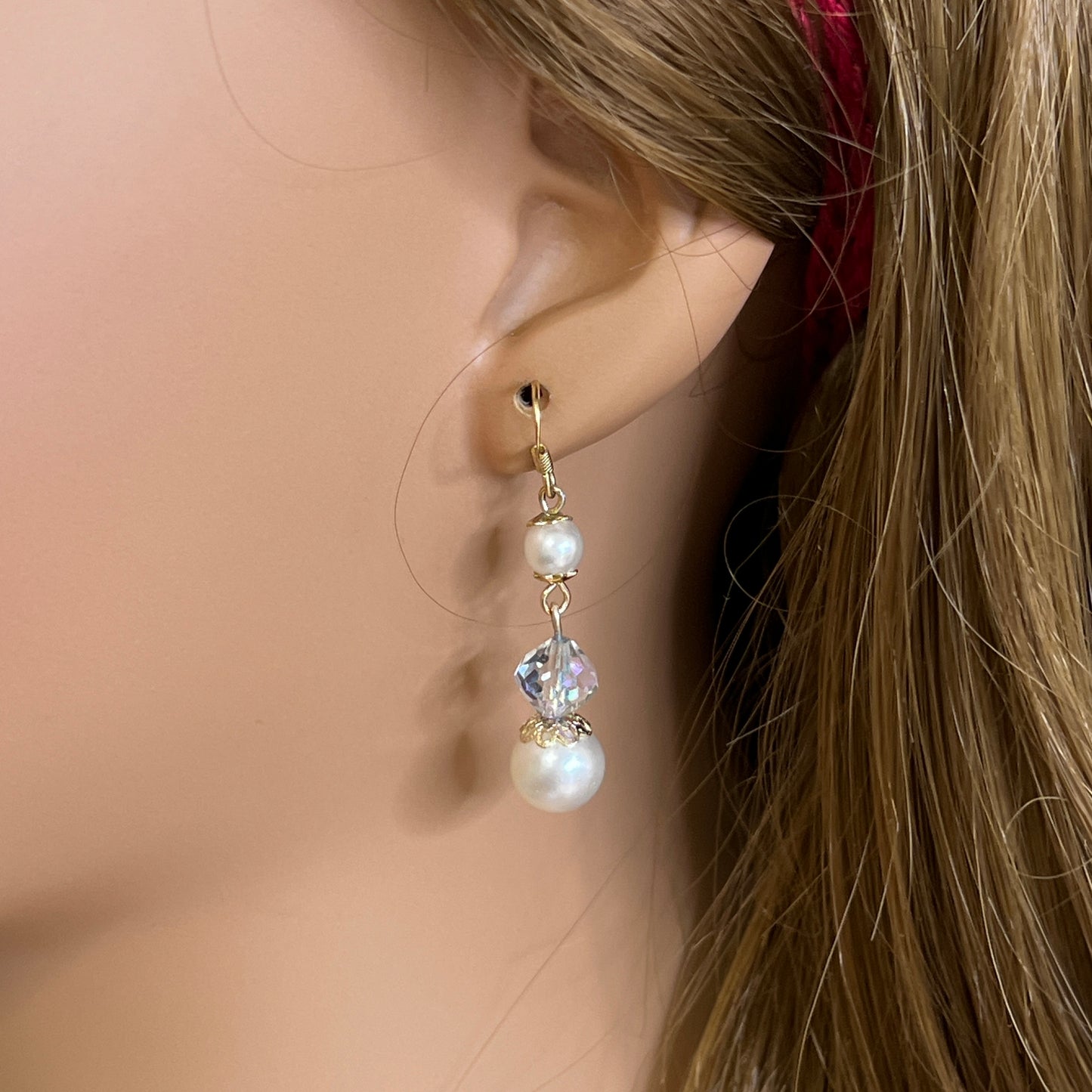 Gold-tone dangle earrings with faux pearls and faceted aurora borealis crystals, vintage 1960s