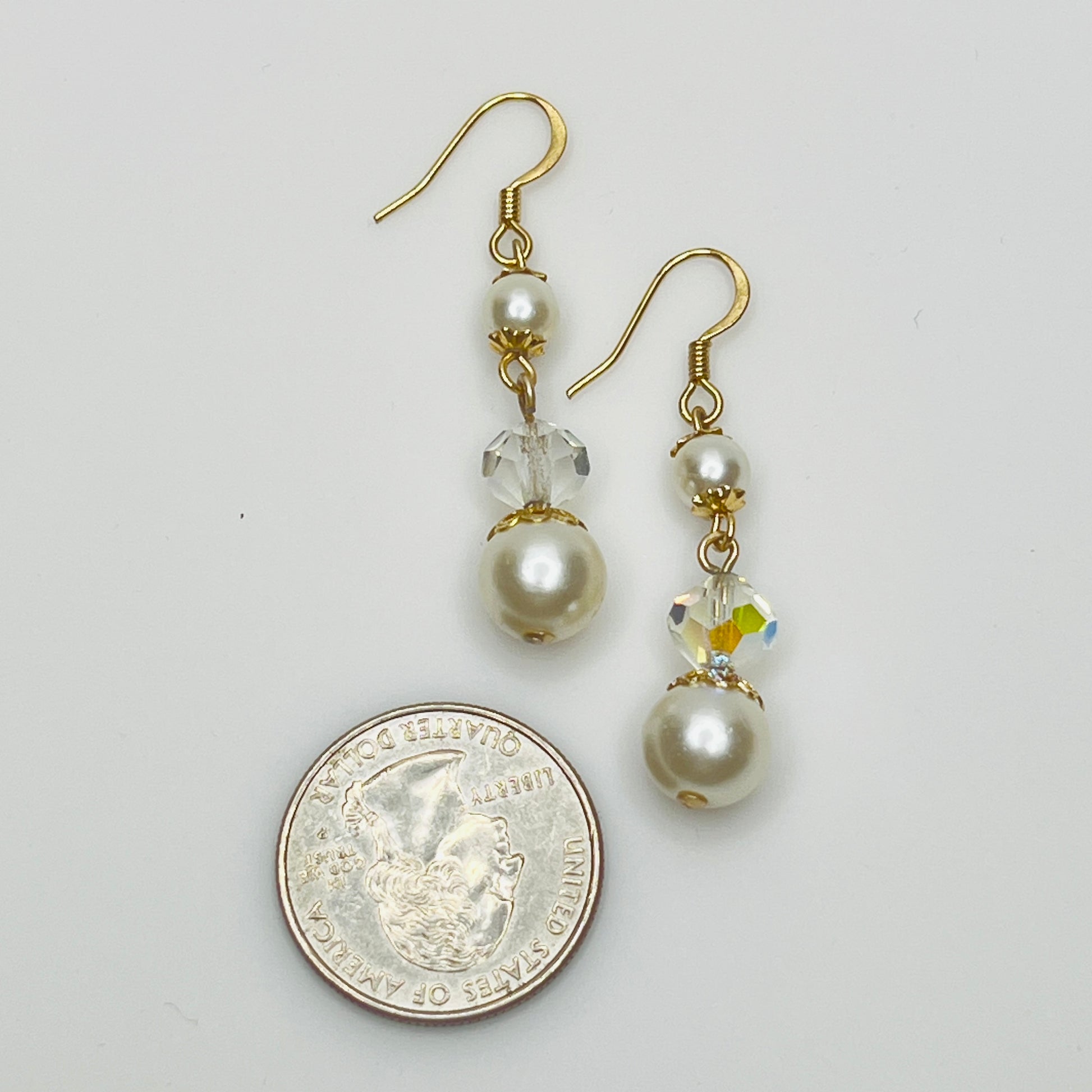 Gold-tone dangle earrings with faux pearls and faceted aurora borealis crystals, vintage 1960s