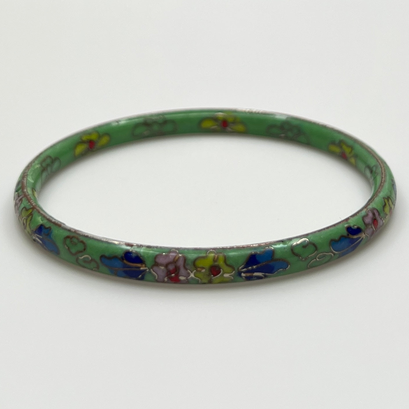 Vintage green cloisonne enamel bangle with colorful floral design
