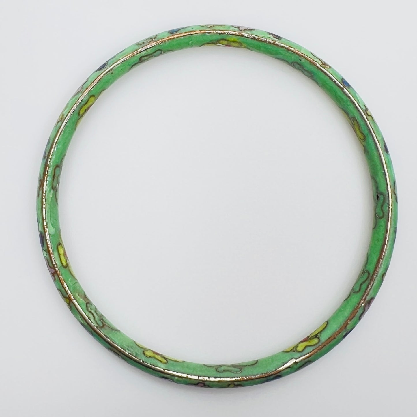 Top view of vintage cloisonne bangle with multicolor flowers
