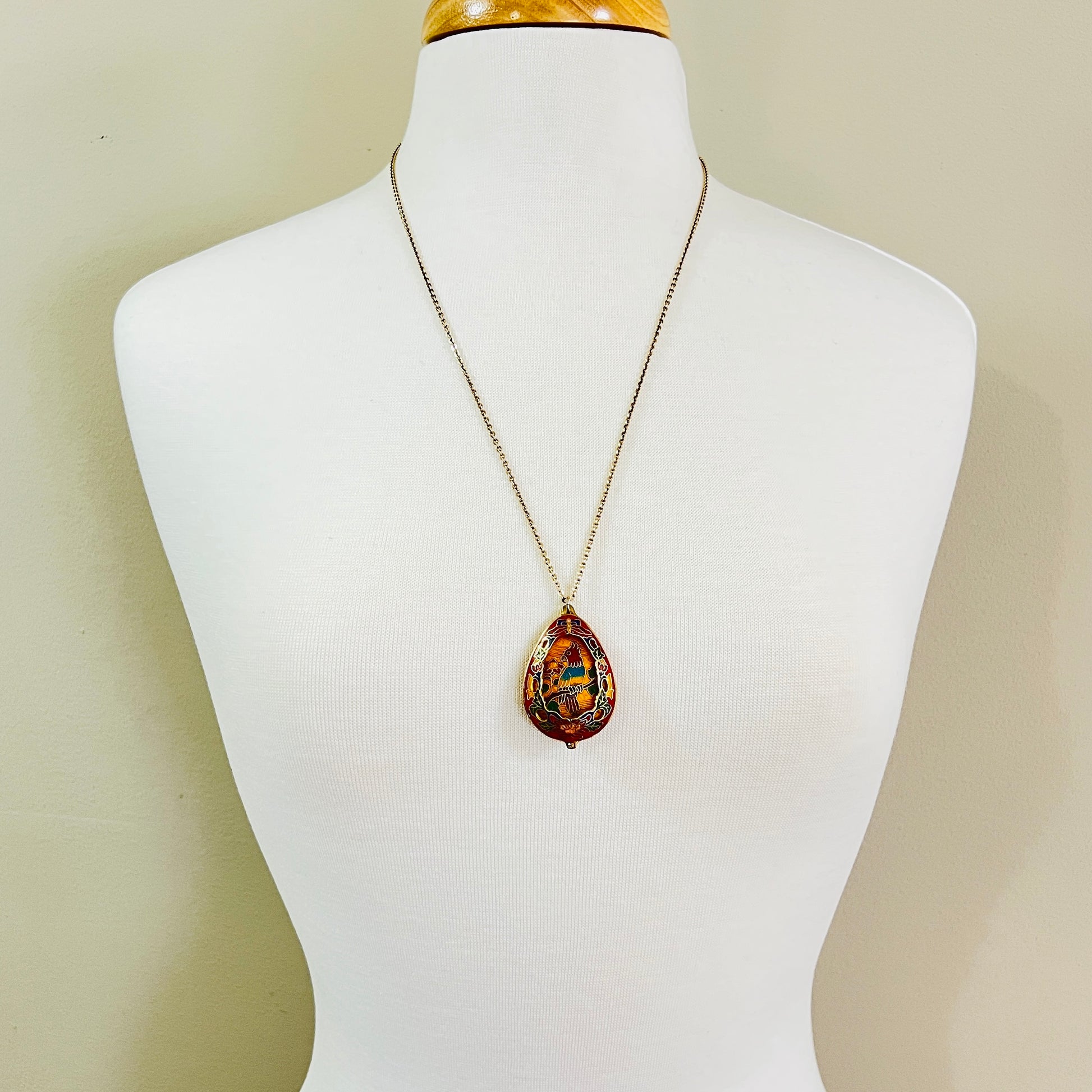 Vintage reversible cloisonné pendant necklace featuring colorful parrot design