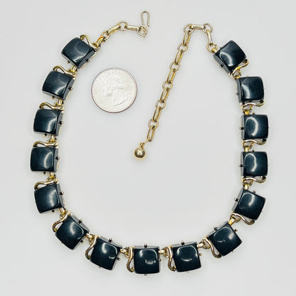 Close-up glossy black thermoset lucite links