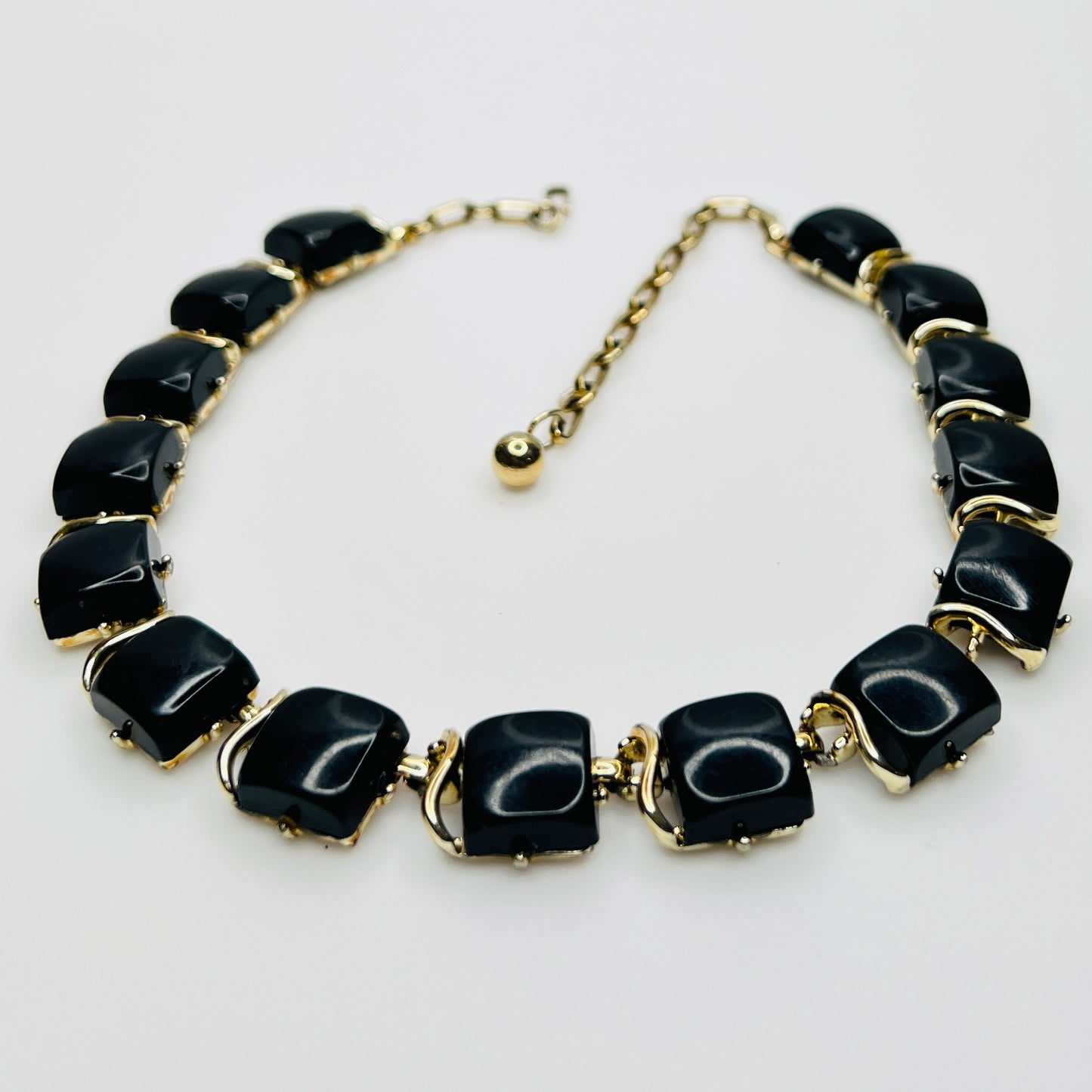 Close-up glossy black thermoset lucite links