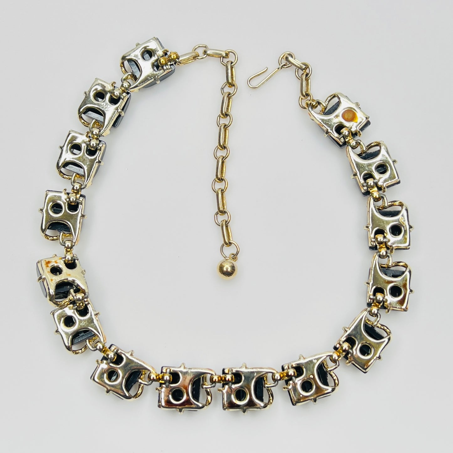 Back view glossy black thermoset lucite links