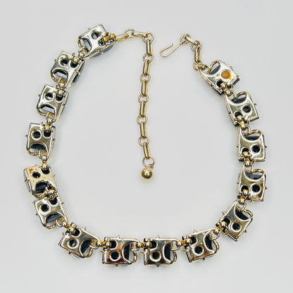 Back view glossy black thermoset lucite links