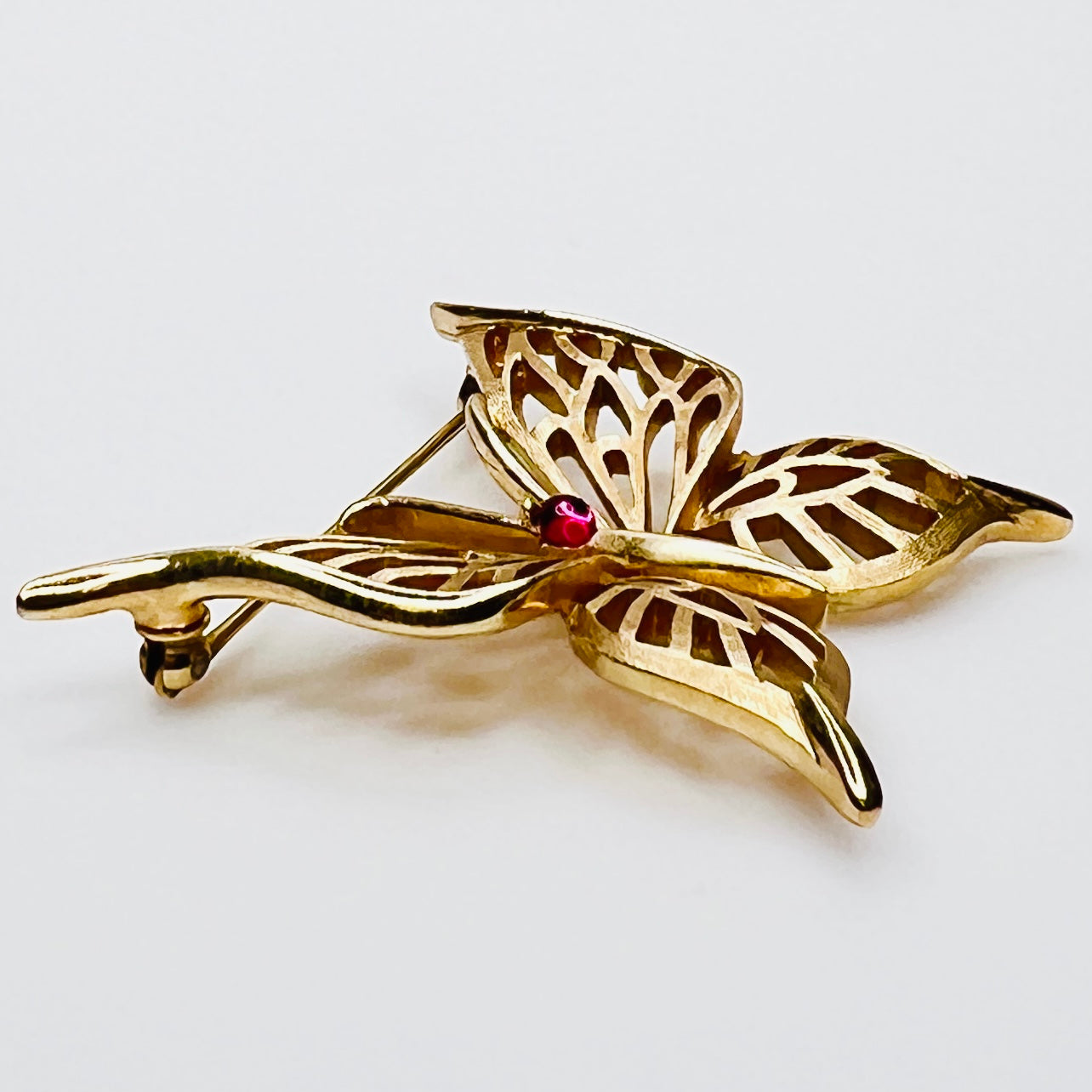 Openwork gold butterfly brooch by Crown Trifari