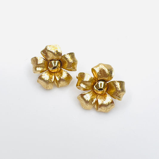 Vintage Crown Trifari gold flower clip-on earrings with sculpted petals.