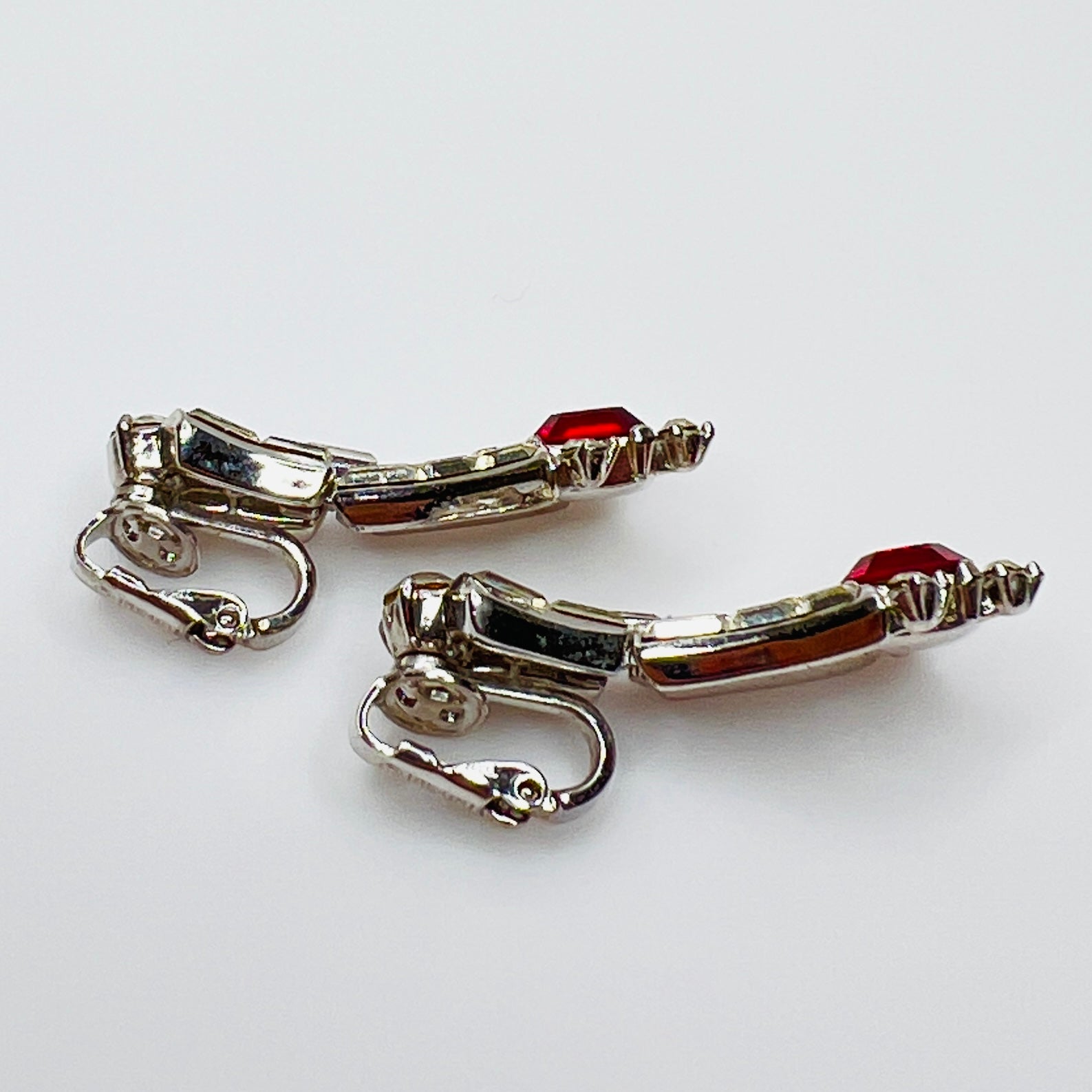 Side view showing articulated drop design of vintage clip-on earrings