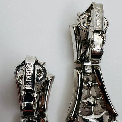 Back of earrings signed Crown Trifari clip backs