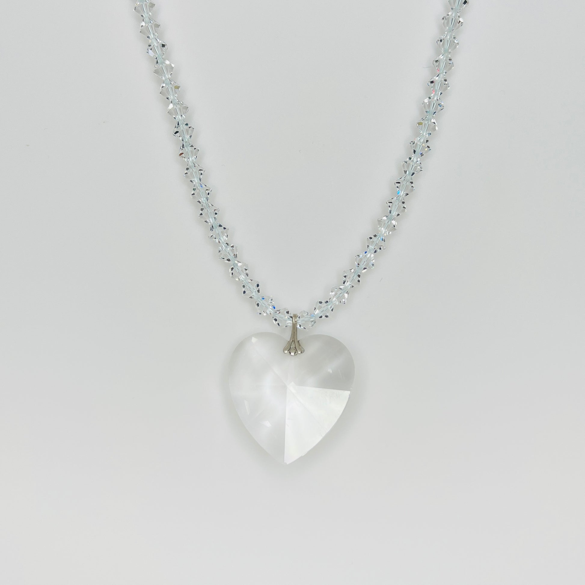 Vintage crystal heart pendant necklace with faceted clear crystal heart and sparkling crystal bicone bead strand