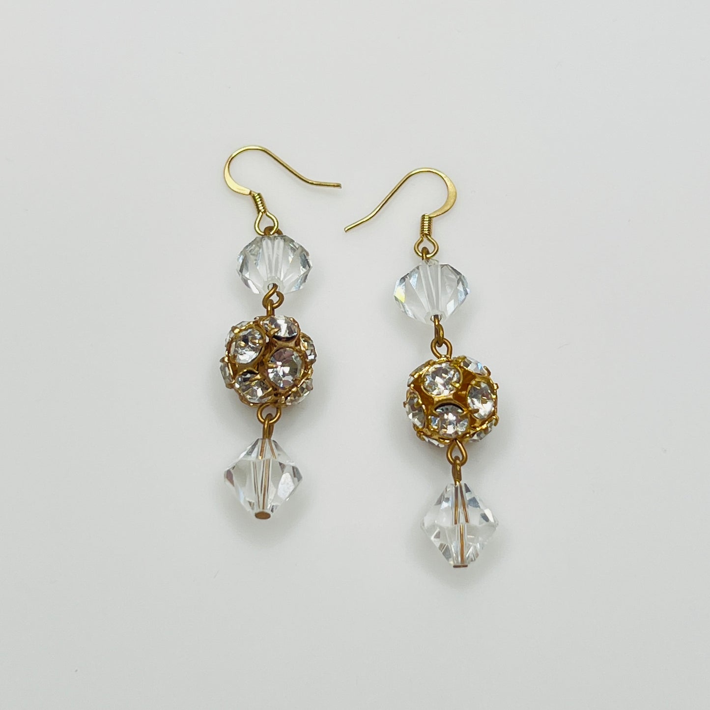 Vintage dangle earrings with clear bicone crystals and gold filigree beads