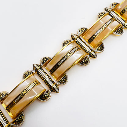Close-up of vintage Damascene bracelet with faux mother-of-pearl panels