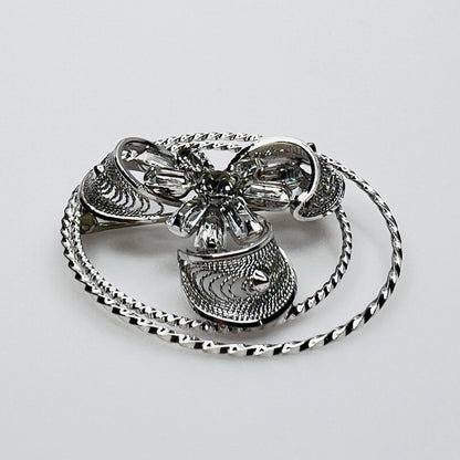 Side view showing dimensional crystal flower and silver loops
