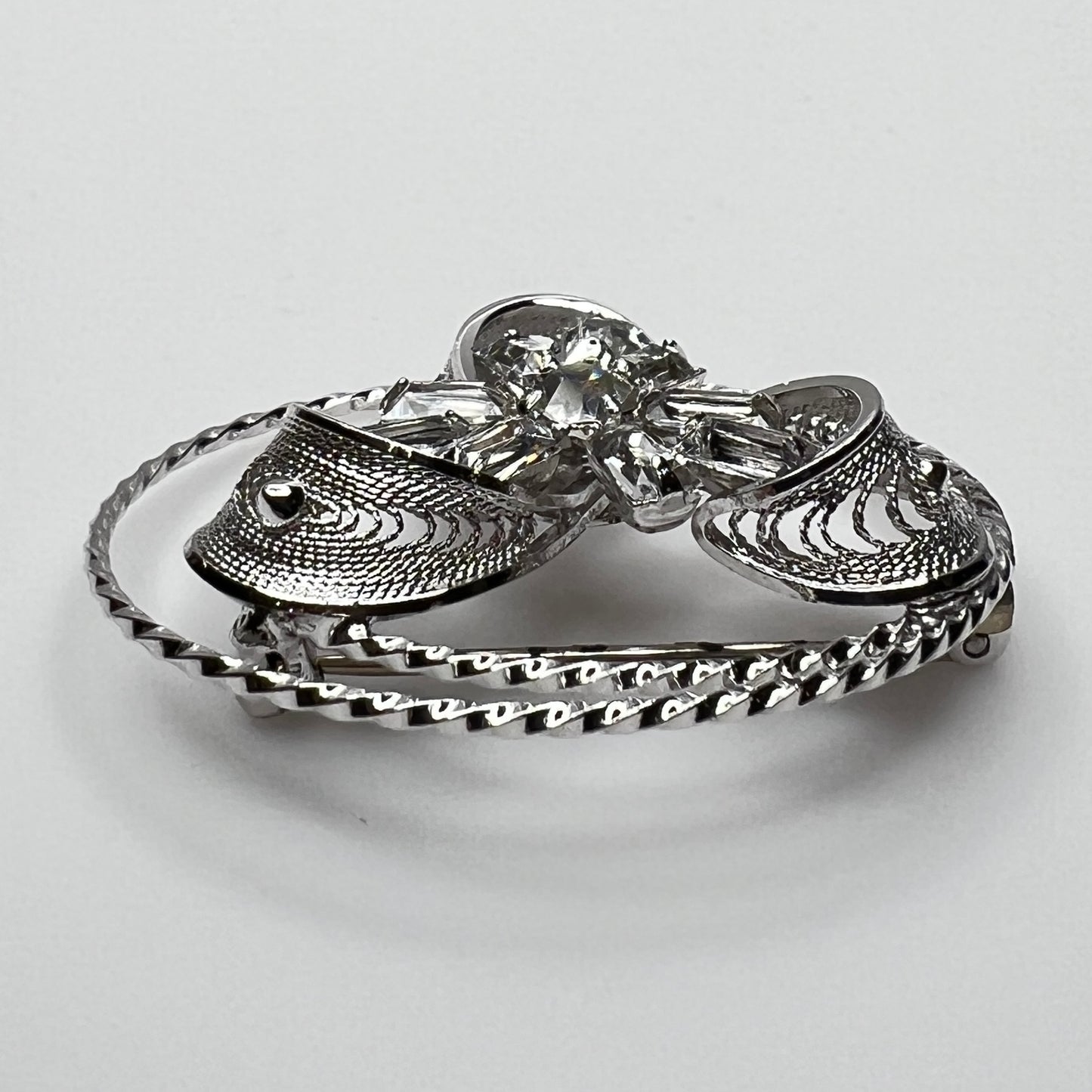 Side view showing dimensional crystal flower and silver loops