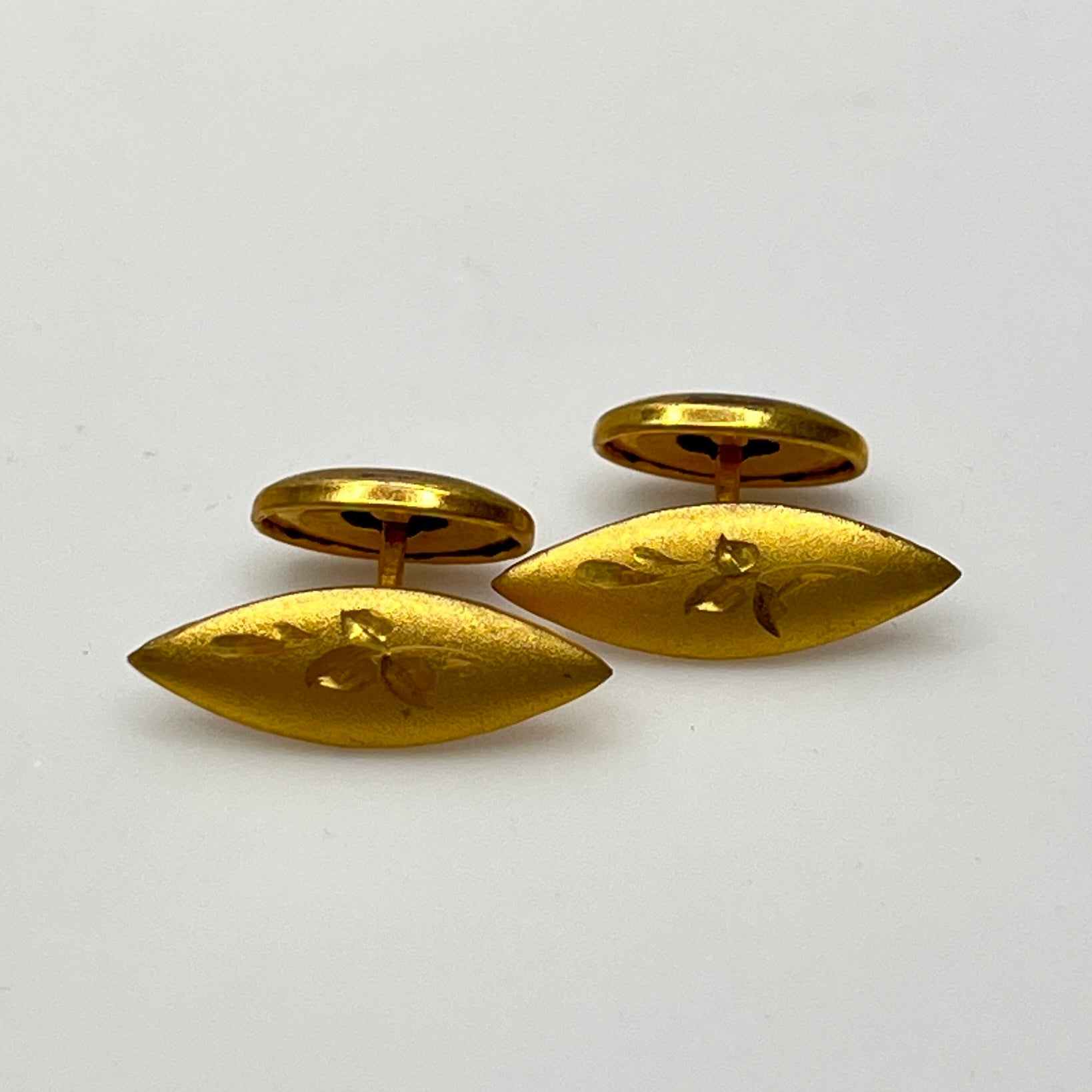 Vintage gold-tone engraved double-sided cufflinks with marquise shape