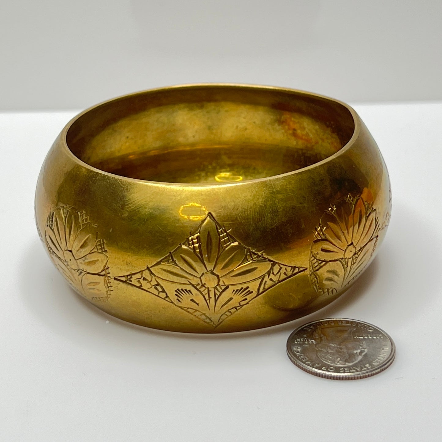 Chunky brass cuff with etched diamond and flower pattern