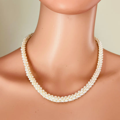 Pearl necklace worn on mannequin classic ivory tone