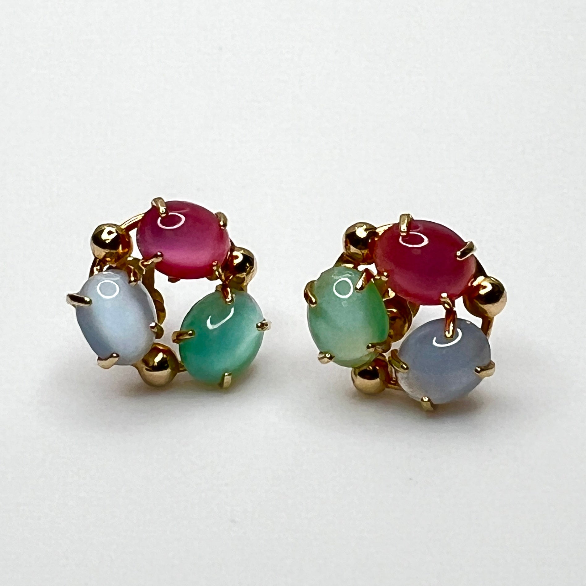 Vintage gold tone fruit salad earrings with pink, blue and green moonglow glass cabochons