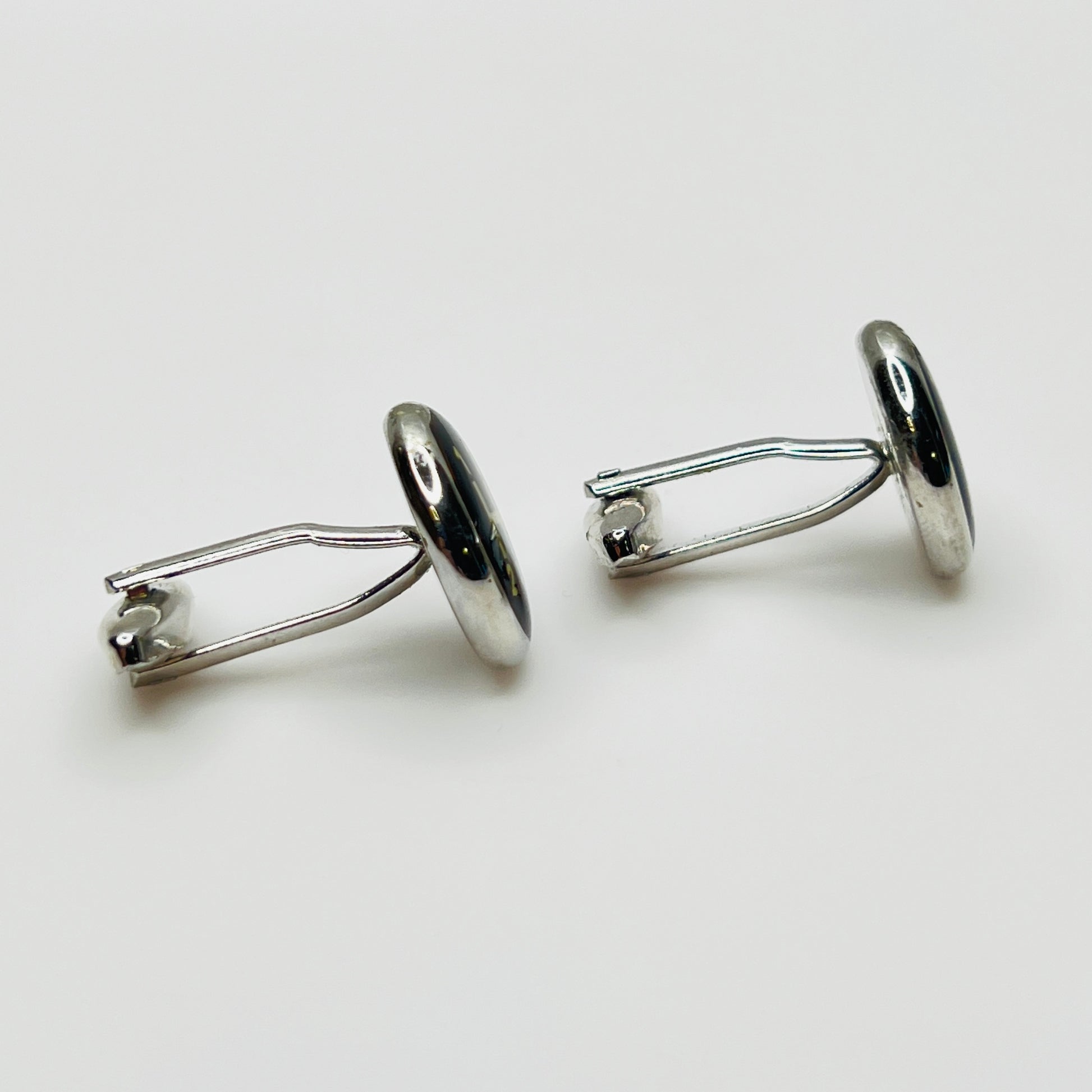 Side view vintage cufflinks showing toggle mechanism