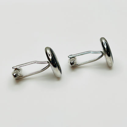 Side view vintage cufflinks showing toggle mechanism