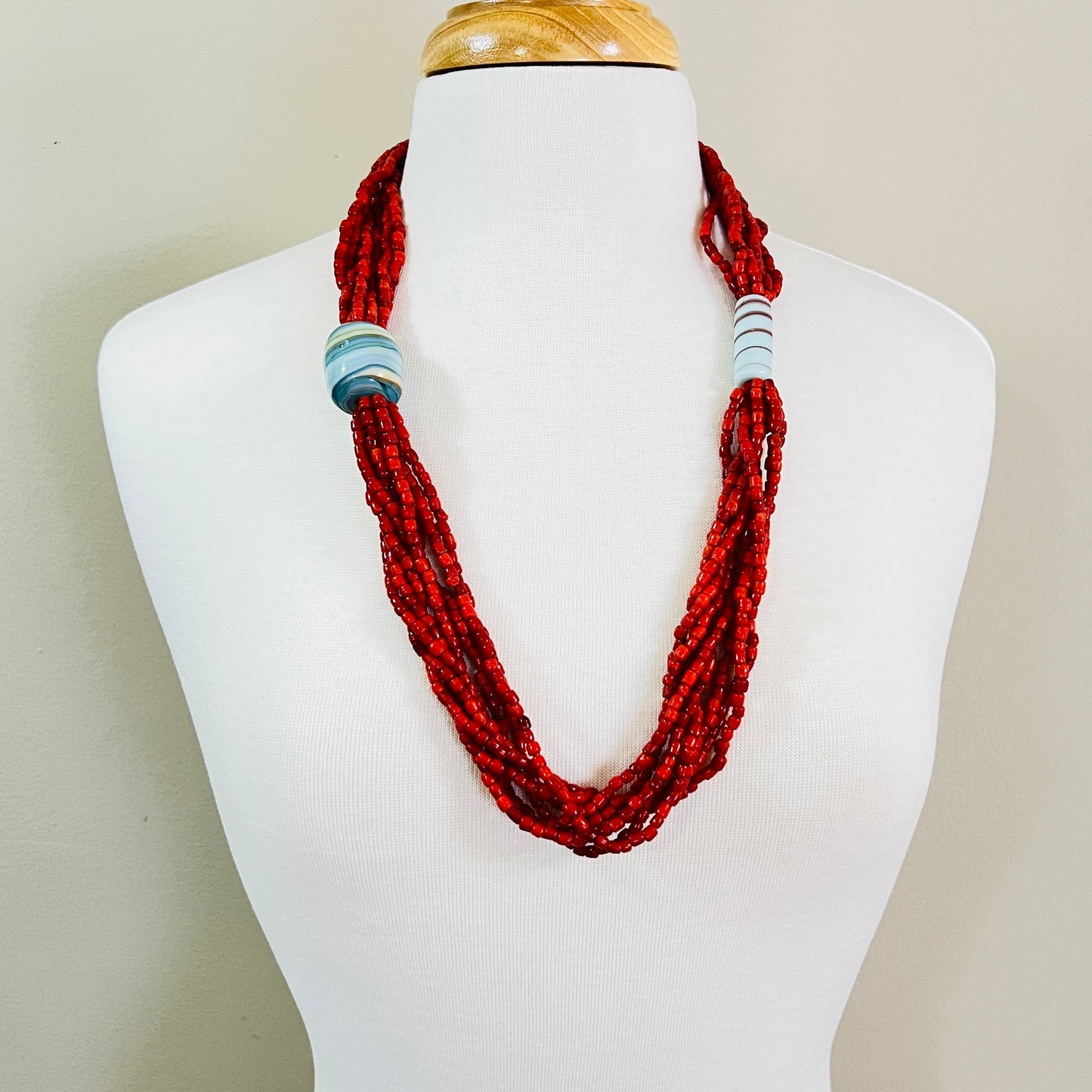 1980s artisan red bead statement necklace worn on mannequin