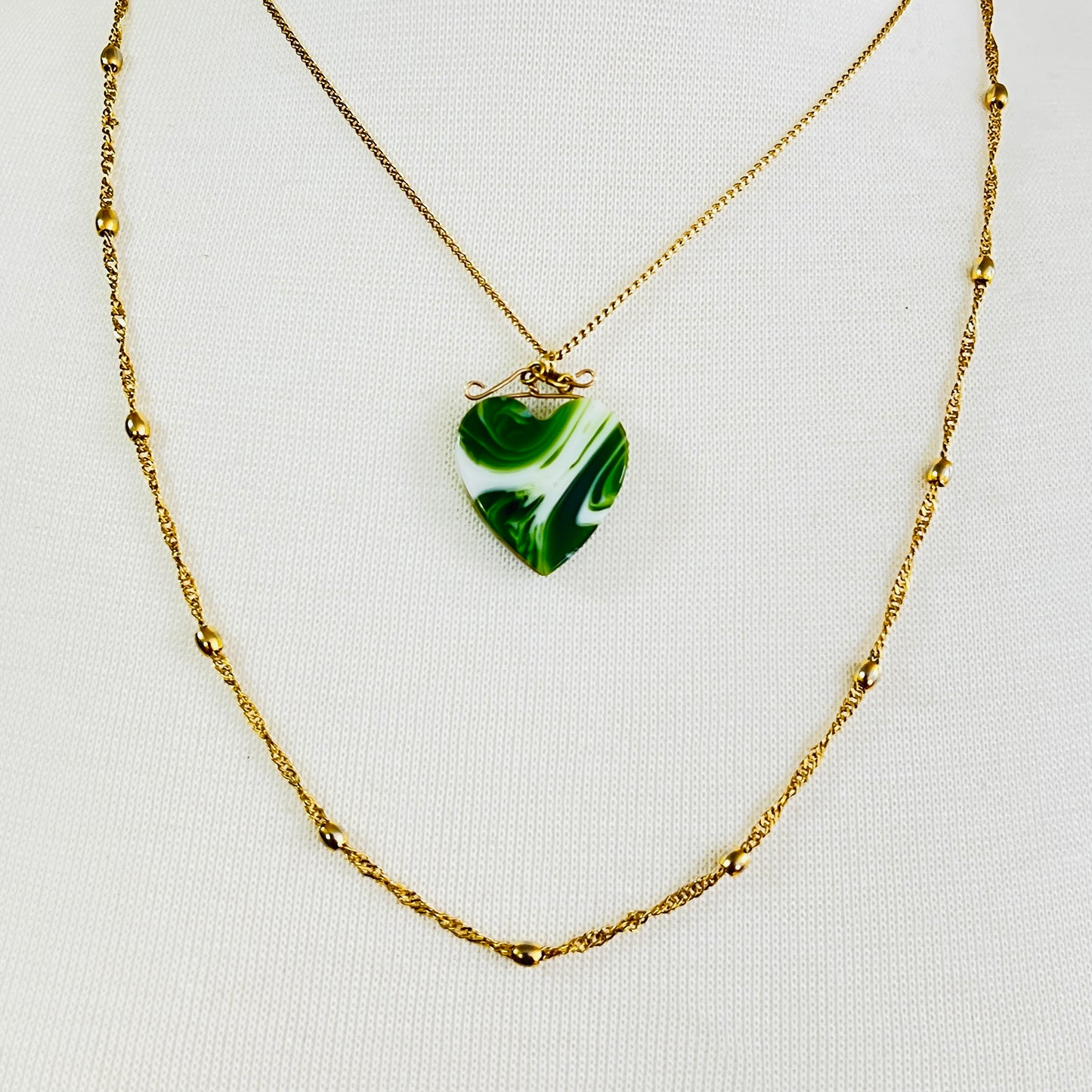 Vintage necklace set with marbled green glass heart pendant and signed Napier gold rope chain