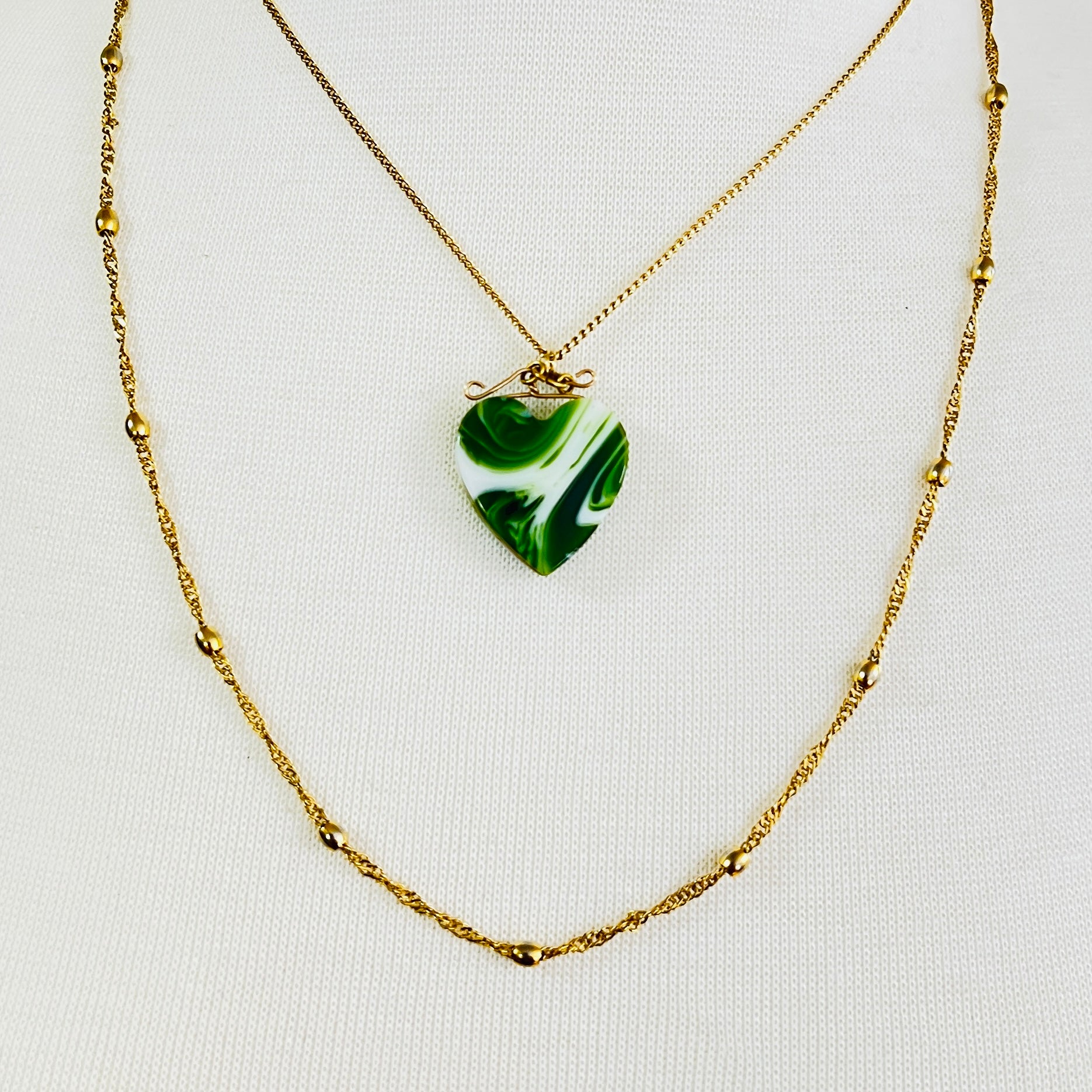 Vintage necklace set with marbled green glass heart pendant and signed Napier gold rope chain
