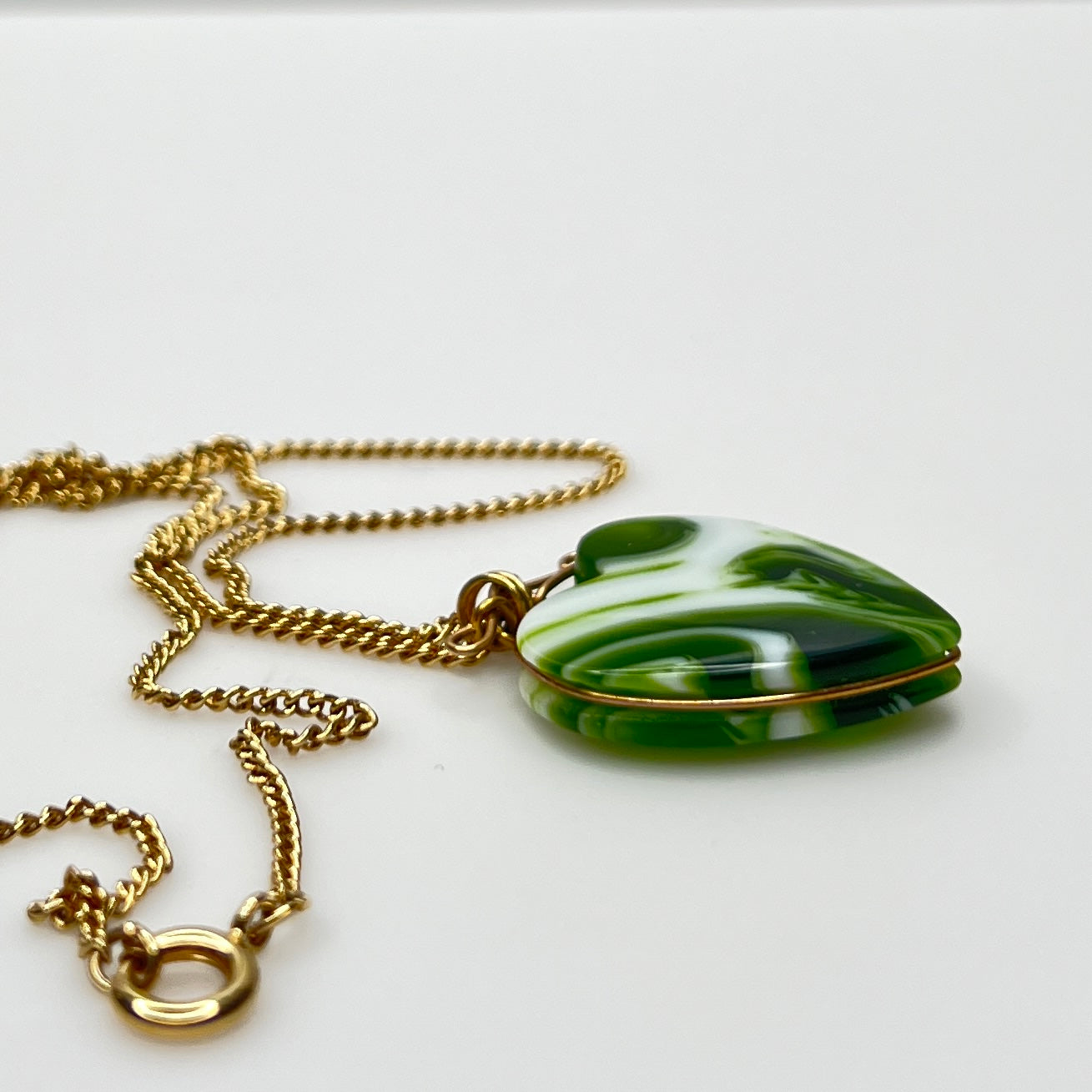 Vintage necklace set with marbled green glass heart pendant and signed Napier gold rope chain