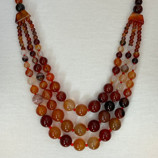 Triple strand vintage glass bead necklace in warm autumn tones