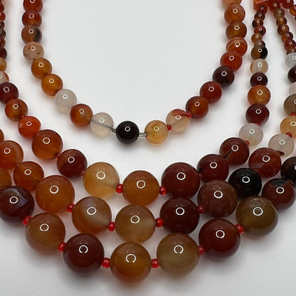 Triple strand vintage glass bead necklace in warm autumn tones