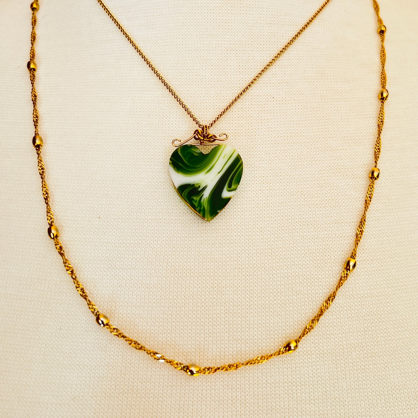 Vintage necklace set with marbled green glass heart pendant and signed Napier gold rope chain