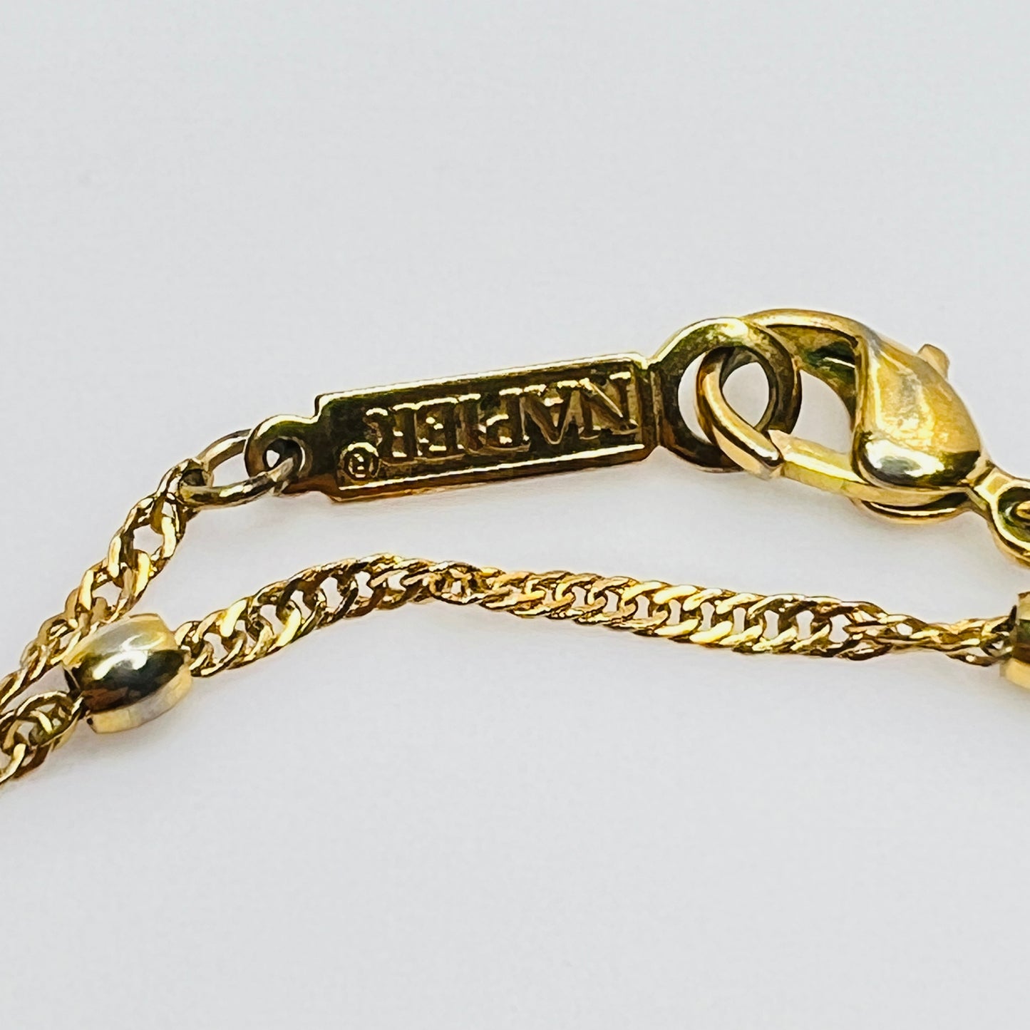 Vintage necklace set with marbled green glass heart pendant and signed Napier gold rope chain