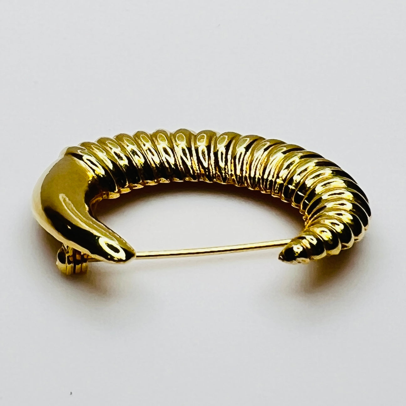 crescent moon brooch in polished gold finish