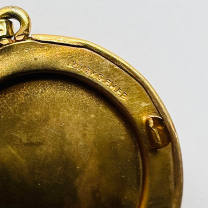 Inside rim stamp 12K gold filled H.F. Barrows locket