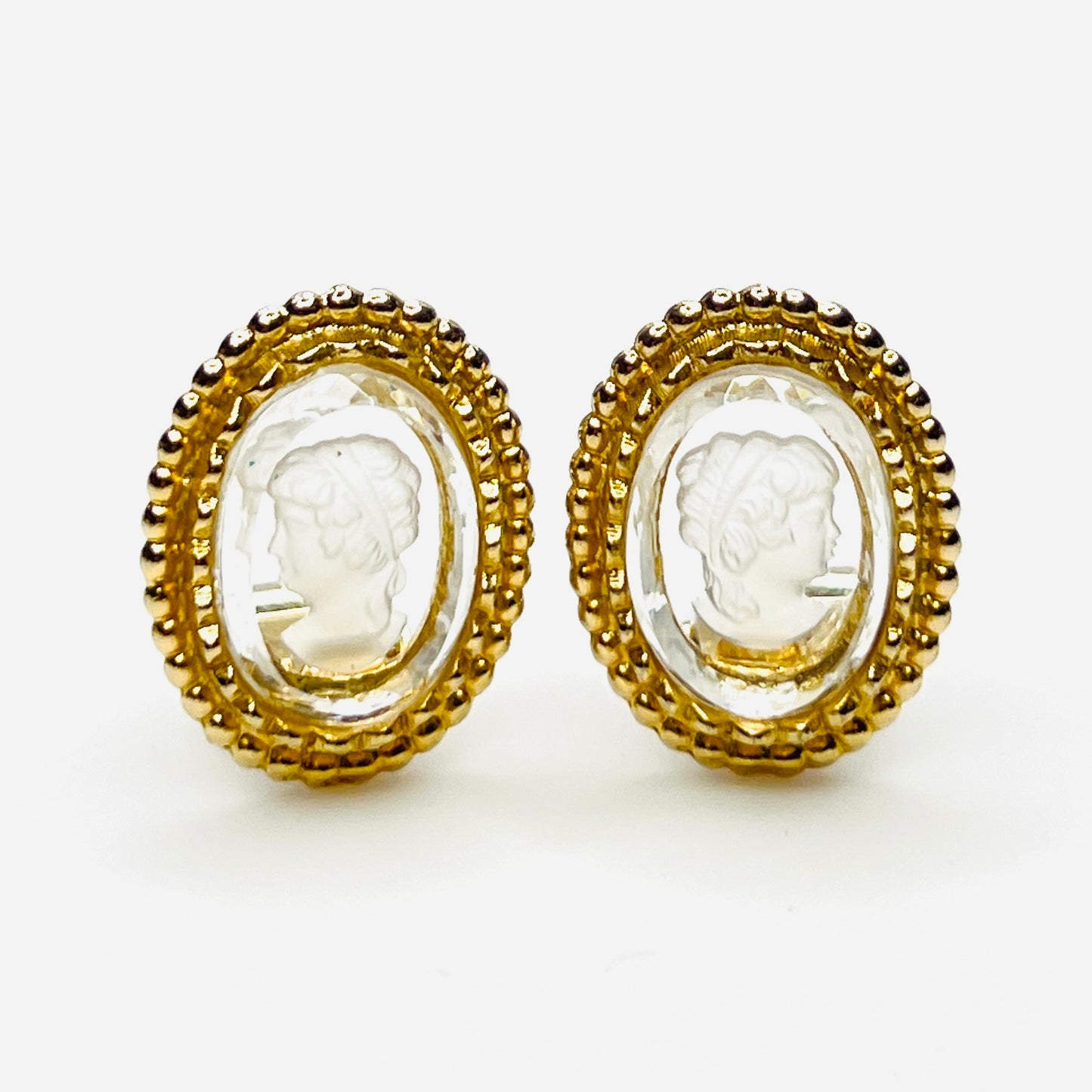Vintage intaglio carved glass cameo clip-on earrings in gold-tone settings