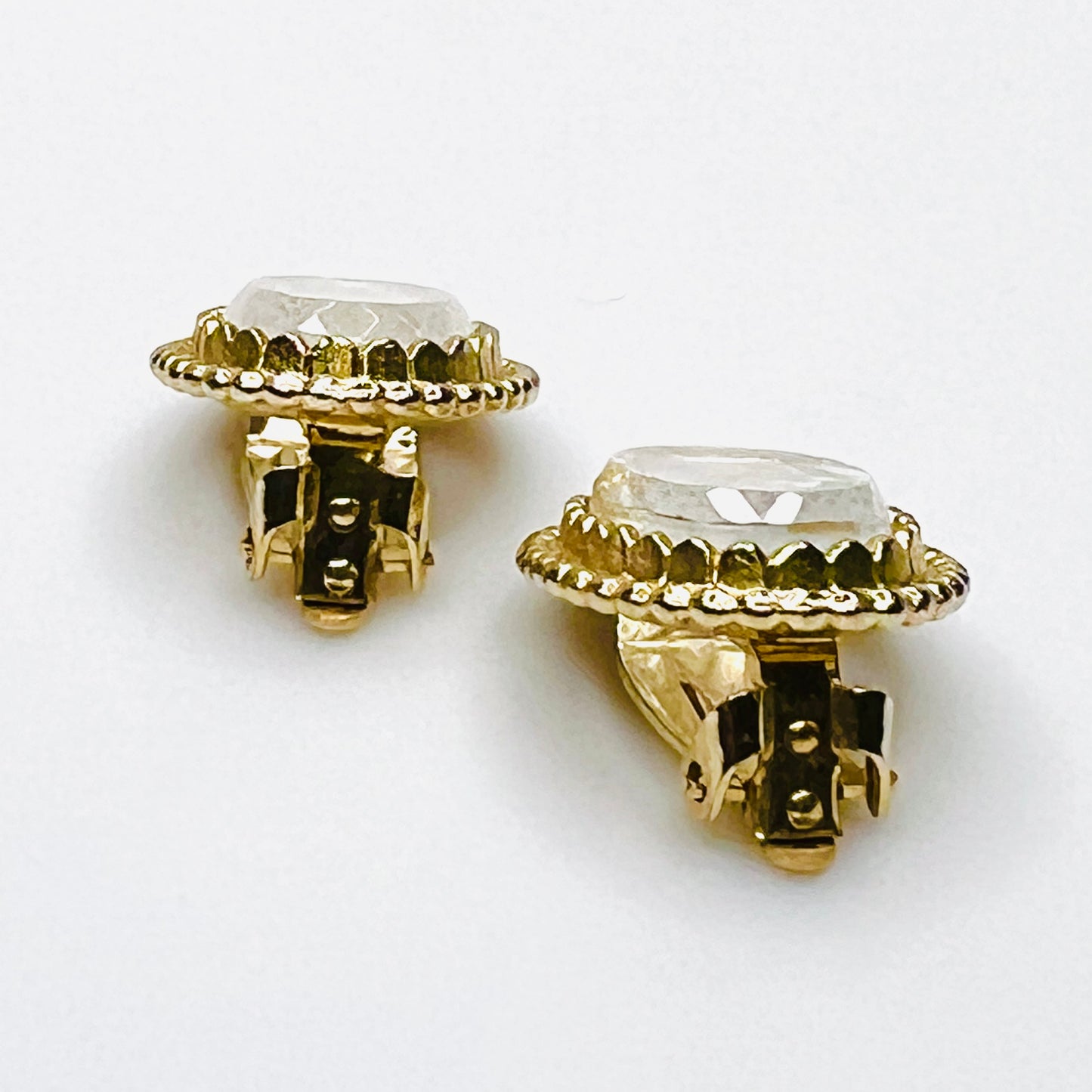 Side profile of vintage intaglio glass cameo clip-on earrings
