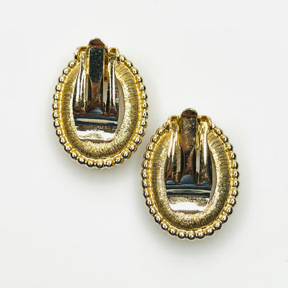 Back view of vintage gold-tone cameo clip-on earrings