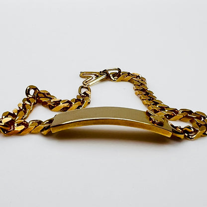 Side view of curved ID plate bracelet with chain links