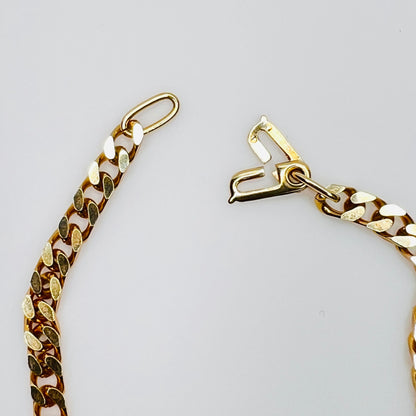 Close-up of hook clasp on vintage gold tone bracelet