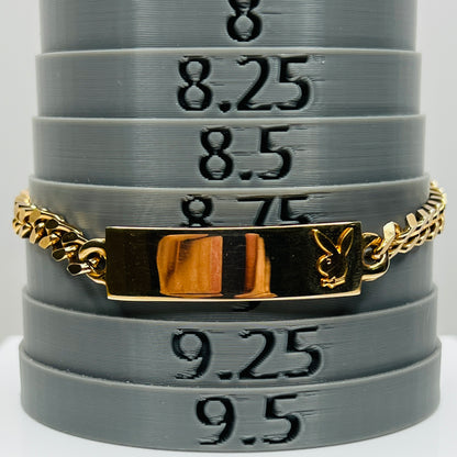 Playboy Bunny ID bracelet on mandrel showing length