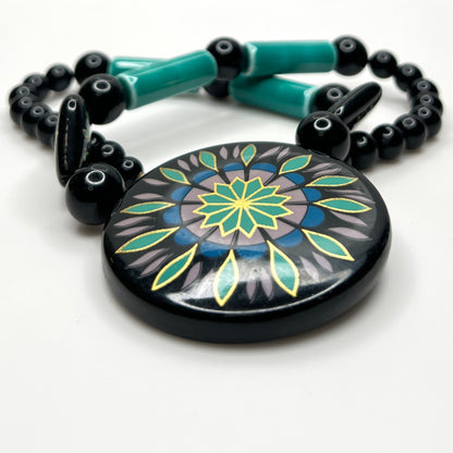 Artisan-style 1980s mixed media statement necklace with hand-painted pendant and turquoise beads