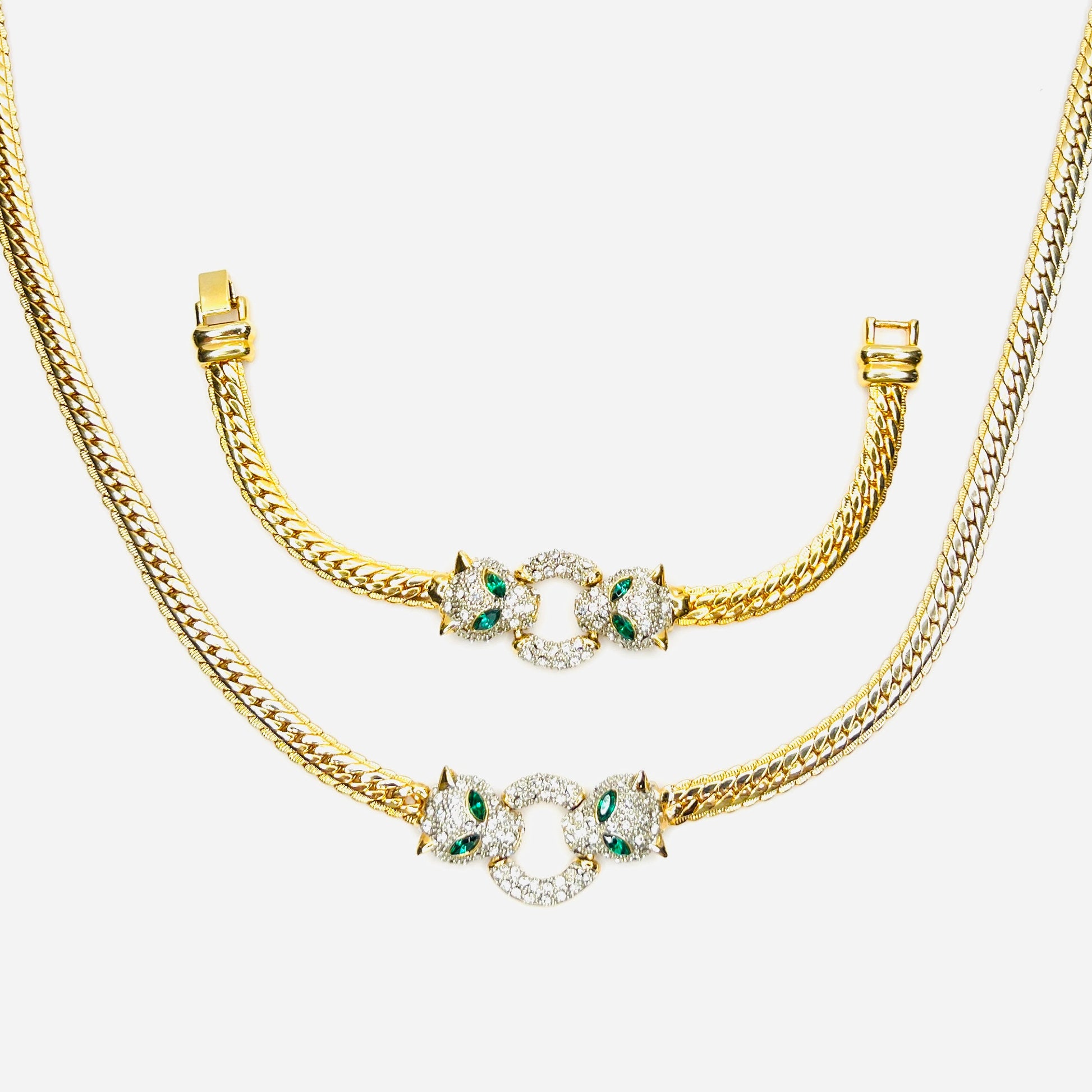 Vintage necklace and bracelet set with rhinestone panther heads and gold herringbone chains