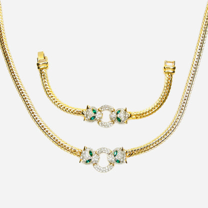Vintage necklace and bracelet set with rhinestone panther heads and gold herringbone chains