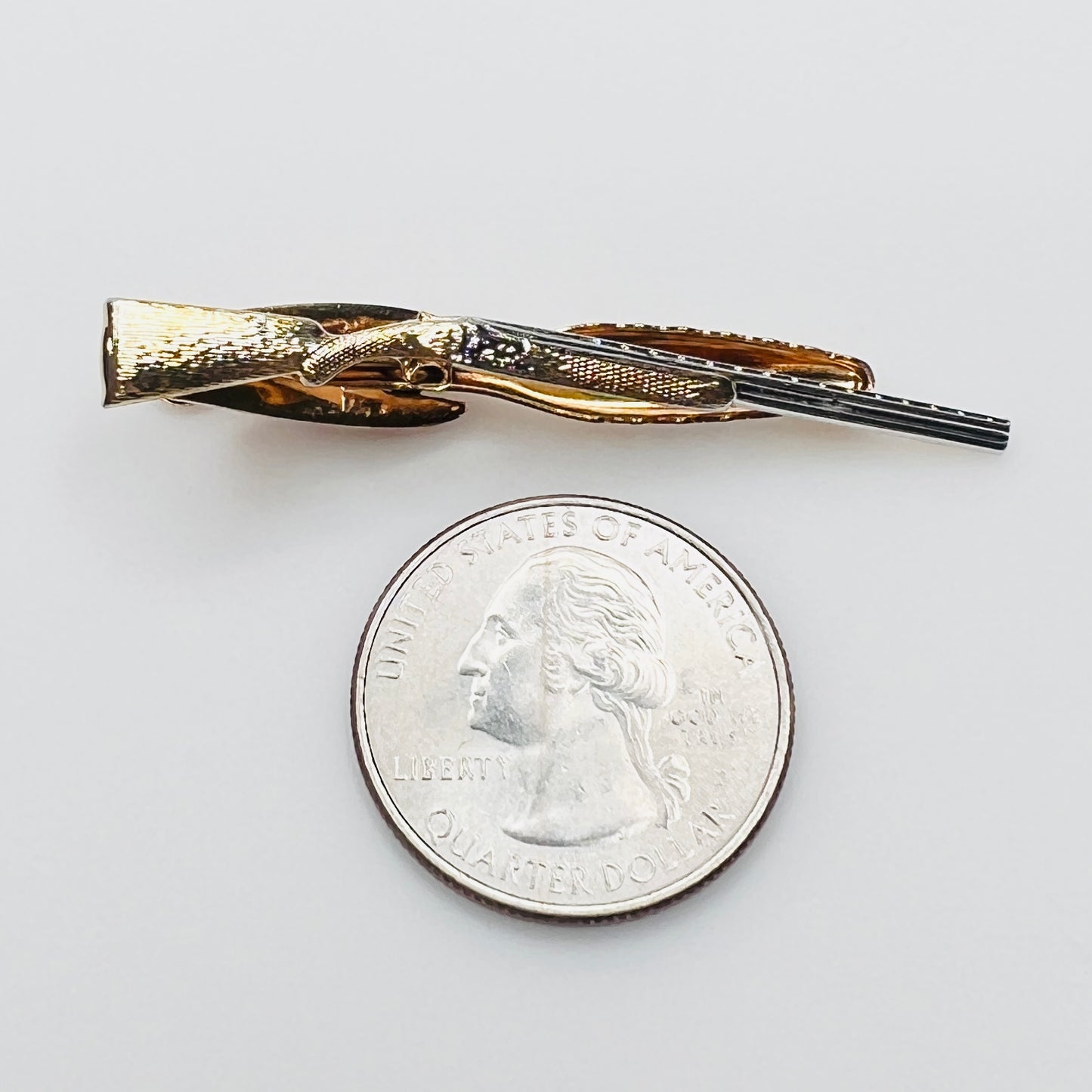 Vintage Hickok shotgun tie clip in gold and silver tone