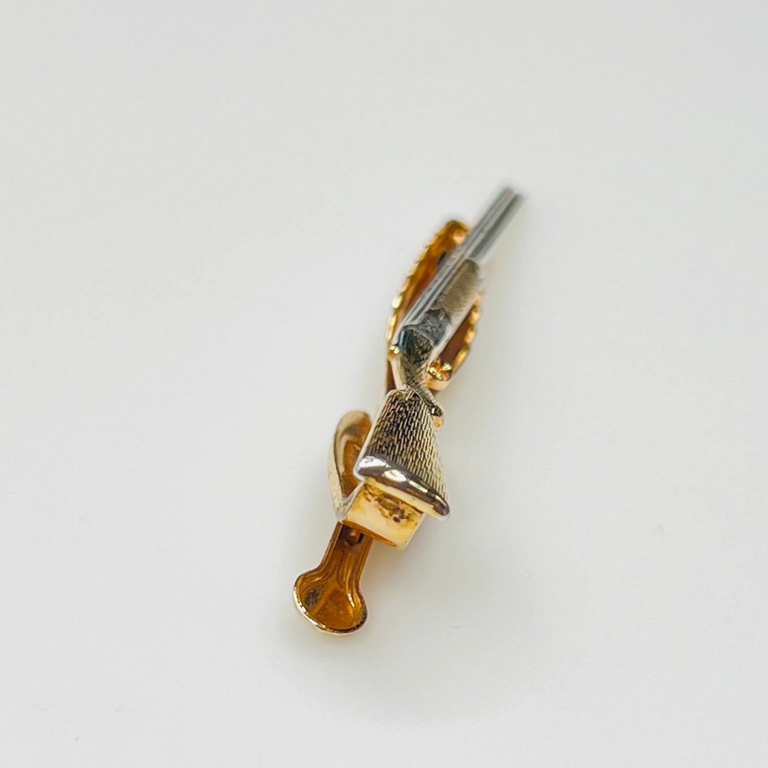 Vintage hunting motif tie clip with two tone finish